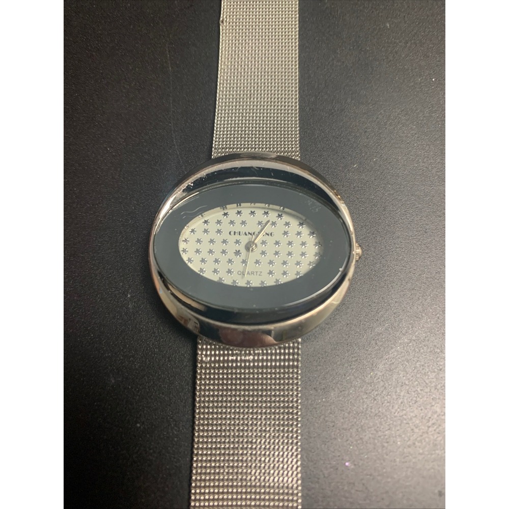 Chuangang Women Quartz‎ Watch Silver Mesh Band Oval Black Star Dial 114
